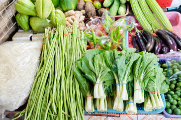 Various vegetables on the counter. organic fresh fruits and vegetables on grocery counter. Selling...