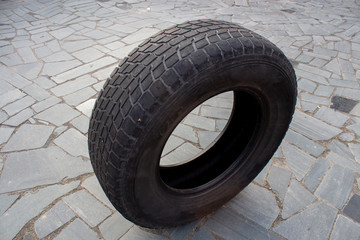 Obraz premium old car tire. worn tread