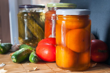 Fresh and Pickled Marinated vegetables. Homemade preserved food of Tomatoes and cucumbers.