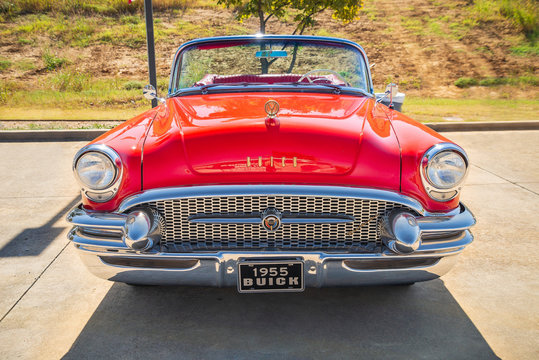 Front view of a red vintage 1955 Buick convertible classic car on October 19, 2019 in Westlake, Texas.