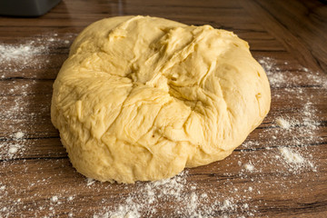 Yeast dough is prepared for the yeast plait