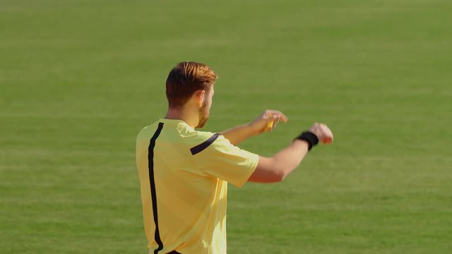 Football Soccer referee whistles and shows penalty after VAR Video Assistant decision, 4k