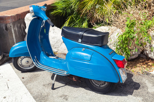 Classic Blue Vespa Sprint 150 Scooter Stands Parked