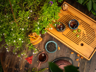 Preparation of the tea ceremony, tea in the bowl. Handmade cups