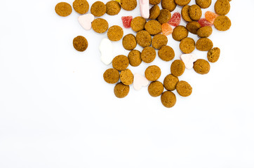 Sinterklaas spices nuts and candies on a white background with space for text