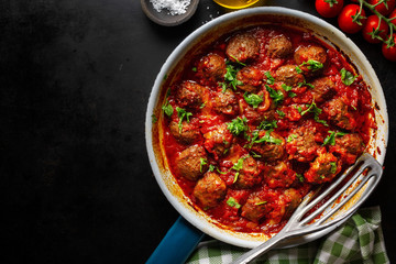 Meatballs with tomato sauce served in pan