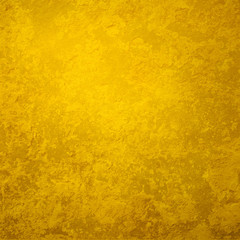 gold background with distressed vintage grunge texture, old dark yellow design that is elegant and classy
