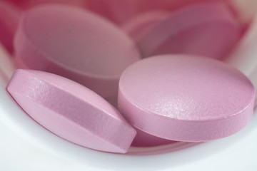 pink pills close-up macro, meds