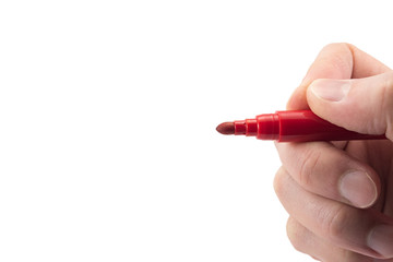 red marker in hand isolated on white background, copyspace