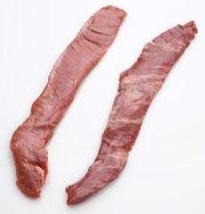 2 raw marbled beef skirt steaks overhead view