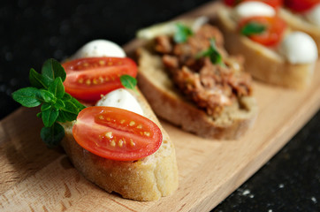 bruschetta with mozzarella cherry tomatoes and Basil, bruschetta with tuna