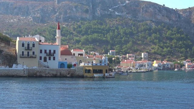 Kastellorizo island, Greece - 1st of October 2019: 4K On the go entering Castellorizo bay