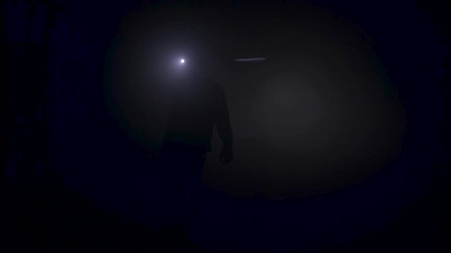 Silhouettes of explorers inside the tunnel of an old abandoned coal mine. Stock footage. People inside the mine holding lanterns and looking for the exit.
