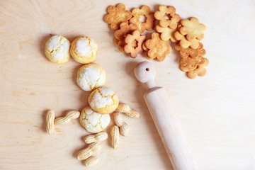shortbread and coconut biscuits on a wood background