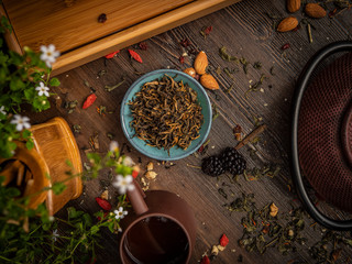 Preparation of the tea ceremony, tea in the bowl. Handmade cups