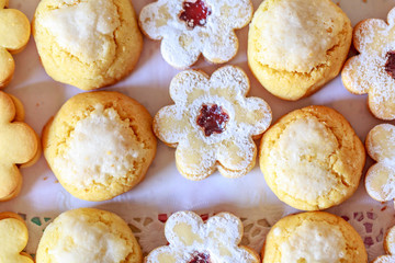shortbread and coconut biscuits on a wood background