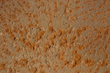 Image of a metal plate covered with rust as background