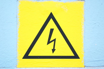 Picture of dilapidated sign Caution high voltage