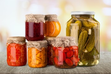 Home Canning Jars of Summer Harvest Vegetable on White Backgroun