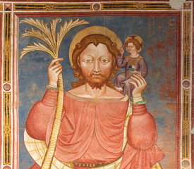 Obraz premium San Cristoforo; affresco esterno della chiesa di Santa Caterina a Breien (Val di Tires, Bolzano)