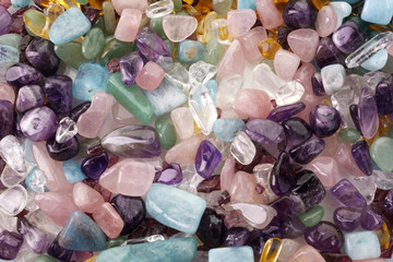 Healing Chakra Crystals Banner. Chakra colored tumbled healing stones.