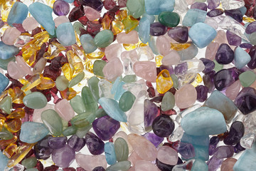 Healing Chakra Crystals Banner. Chakra colored tumbled healing stones.