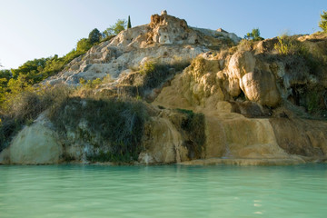 Fototapeta na wymiar Bagno Vignoni hot spring of thermal water baths in Tuscany, Italy.
