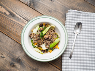 Soba noodle vegetable pan with pak choi - copy space