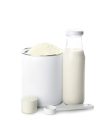 Bottle of milk and jar with baby formula on white background