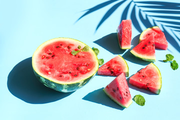 Tasty watermelon with mint on color background