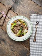Soba noodle vegetable pan with pak choi - copy space