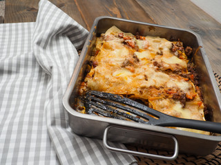 Top view of a whole lasagne in an ovenproof dish