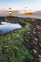 Fototapeta na wymiar Penmon, pen Mon Lighthouse at sunset