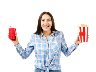Young woman with popcorn and soda drink on white background
