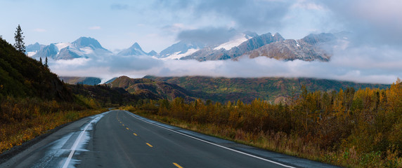 Panorama of road to Valdez surrounded by mountains in Alaska - 297427650