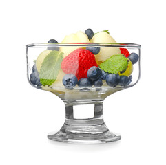 Bowl of tasty fruit salad on white background