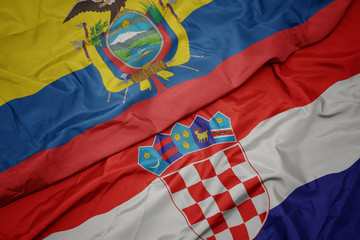 waving colorful flag of croatia and national flag of ecuador.