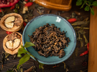 Preparation of the tea ceremony, tea in the bowl. Handmade cups
