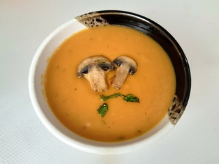 Cream soup with pumpkin and mushrooms