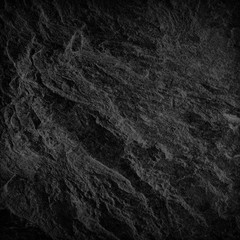 Dark grey black slate background or texture. black stone
