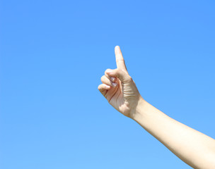 Woman hand isolated on clear sky background