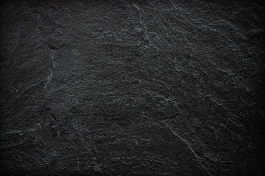 Dark grey black slate background or texture