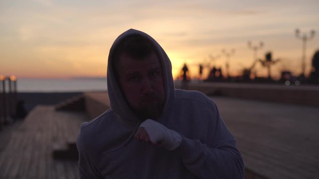 Boxing workout outdoor at sunset