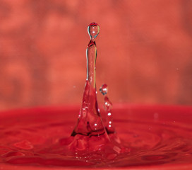 Water Splash photography with red background