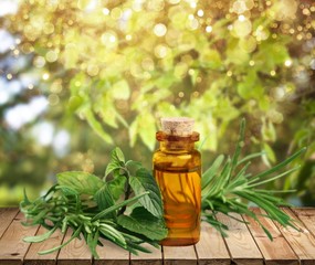 Essential Oil with Rosemary Sprig Isolated