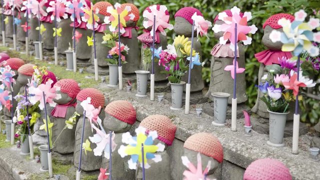 ozijo sama statues in japan, tracking close up shot
