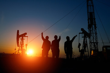Fototapeta na wymiar The oil workers in the job