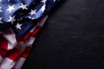 Happy Veterans Day. American flags veterans against a blackboard background. - obrazy, fototapety, plakaty
