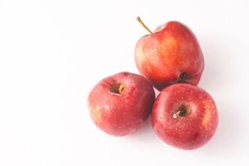 Red apples isolated against white