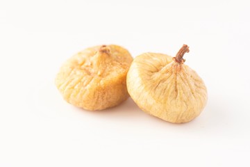 Dried figs isolated against white